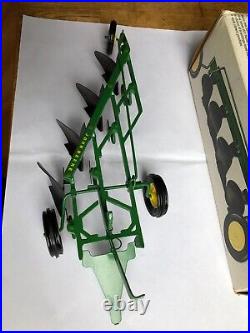 1968 John Deere 4 bottom plow'F660H' in 1/16 scale by Ertl In Ice Cream Box