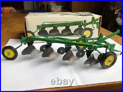 1968 John Deere 4 bottom plow'F660H' in 1/16 scale by Ertl In Ice Cream Box