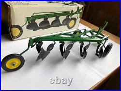 1968 John Deere 4 bottom plow'F660H' in 1/16 scale by Ertl In Ice Cream Box