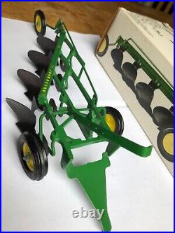 1968 John Deere 4 bottom plow'F660H' in 1/16 scale by Ertl In Ice Cream Box