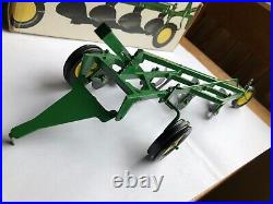 1968 John Deere 4 bottom plow'F660H' in 1/16 scale by Ertl In Ice Cream Box