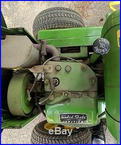1969 John Deere 112 Riding Mower with plow and snow blower. Runs great