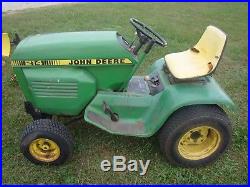 1979 John Deere 214 Lawn Tractor with Mowing Deck, Tiller, Snow Plow, and Weights