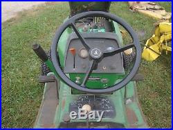 1979 John Deere 214 Lawn Tractor with Mowing Deck, Tiller, Snow Plow, and Weights