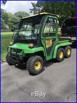 2008 John Deere Gator 6x4 Th. Only Has 225 Hours. Curtis Cab, winch And Plow