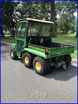 2008 John Deere Gator 6x4 Th. Only Has 225 Hours. Curtis Cab, winch And Plow