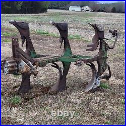 Antique john deere plow MODEL 825 ROLLOVER