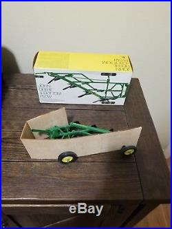 Ertl John Deere plow in ice cream box with insert. New, never played with