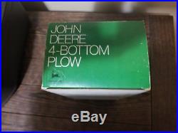 Ertl John Deere plow in ice cream box with insert. New, never played with