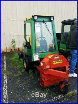 JOHN DEERE F1145 TRACTOR (4WD) With BLOWER, PLOW, & STREET SWEEPER ATTACHMENT