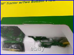JOHN DEERE M TRACTOR WithTWO BOTTOM PLOW 1/16 SPECCast Classic Series Sealed Tires