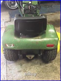 John Deere 110 garden tractor with snow blower/snow plow & more