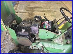 John Deere 110 garden tractor with snow blower/snow plow & more