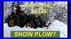 John_Deere_3038e_Plowing_Snow_With_Hydraulic_Curtis_Plow_01_cga