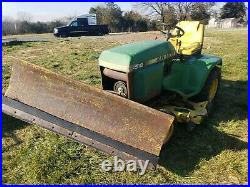 John Deere 318 Tractor with Plow