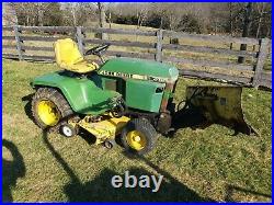 John Deere 318 Tractor with Plow