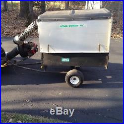 John Deere 318 hydrostatic lawn tractor, hydraulic plow and vacuum trailer