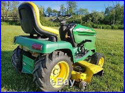 John Deere 325 54 deck and 4ft plow and wheel weights