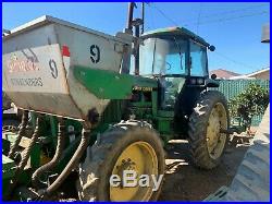 John Deere 4255 Row Crop Tractor/Rear Shank Plow and front fertilizer hopper