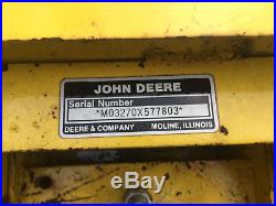 John Deere 48 inch snow plow, weights, and chains