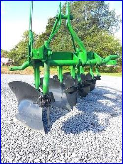 John Deere 4 BOTTOM PLOW WithCOULTERS & TAIL WHEEL