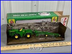 John Deere 8010 4WD Tractor w Plow 2009 Rantoul, IL Show Tractor 132 Ertl RARE