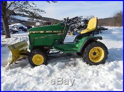 John Deere GT Lawn Mower with snow plow and roller included