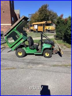 John Deere Gator UTV Utility Vehicle 2 Wheel drive with powerDump Bed and plow