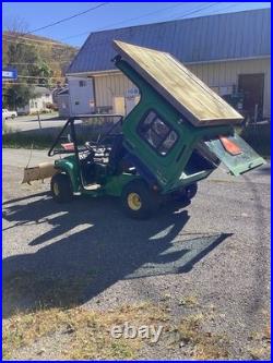 John Deere Gator UTV Utility Vehicle 2 Wheel drive with powerDump Bed and plow
