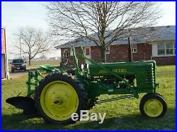 John Deere H Tractor With H10, H4, H3 And H1 Rare Moldboard Plows