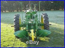 John Deere H Tractor With H10, H4, H3 And H1 Rare Moldboard Plows
