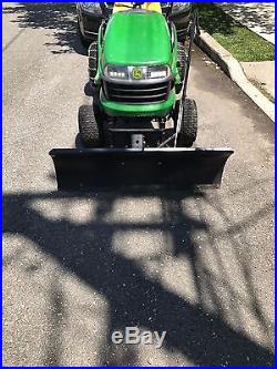 John Deere L115 Lawn Tractor With Snow Plow and Chains