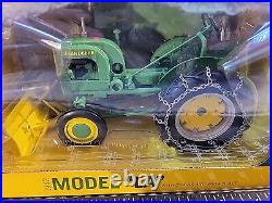 John Deere LA withChains And Snow Blade 1/16 Diecast Tractor Replica by SpecCast