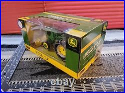 John Deere LA withChains And Snow Blade 1/16 Diecast Tractor Replica by SpecCast