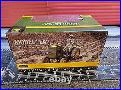 John Deere LA withChains And Snow Blade 1/16 Diecast Tractor Replica by SpecCast