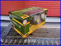 John Deere LA withChains And Snow Blade 1/16 Diecast Tractor Replica by SpecCast