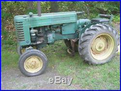 John Deere M farm tractor with plow and disk runs