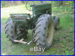 John Deere M farm tractor with plow and disk runs