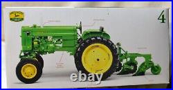 John Deere Model 40T WithWide Front And Mounted Two-Bottom Plow