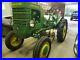 John_Deere_Starter_L_Antique_Tractor_1939_With_One_Bottom_Plow_Cultivator_01_sk