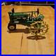 John_Deere_Tractor_Plow_Metal_Figurine_With_Rolling_Wheels_01_dq