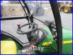 John Deere X700 With Cab with Snow Plow and Mower