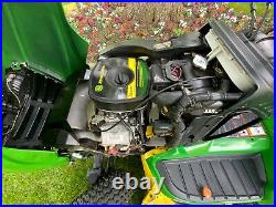 John Deere X738 Tractor with 8 Mowing, Plowing & Yard Maintenance Attachments