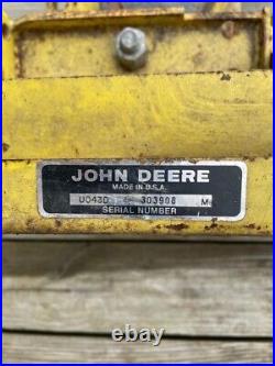 John Deere riding mower plow