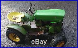 John deere 110 round fender tractor with plow and snow thrower