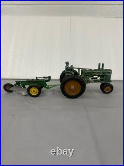John deere collectibles Hi post A Tractor and 2 bottom plow John deere collectibles Hi post A Tractor and 2 bottom plow