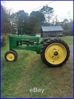 John deere tractor B Comes with sickle bar cutter and plow