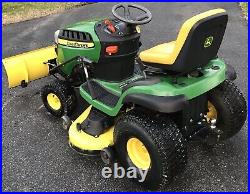 Restored John Deere D140 Riding Lawn Tractor with Plow & Over Sized Tires