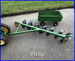 VTG Ertl Co. John Deere Dyersville, lowa USA 52040 with6 bottom plow and trailer