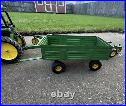 VTG Ertl Co. John Deere Dyersville, lowa USA 52040 with6 bottom plow and trailer